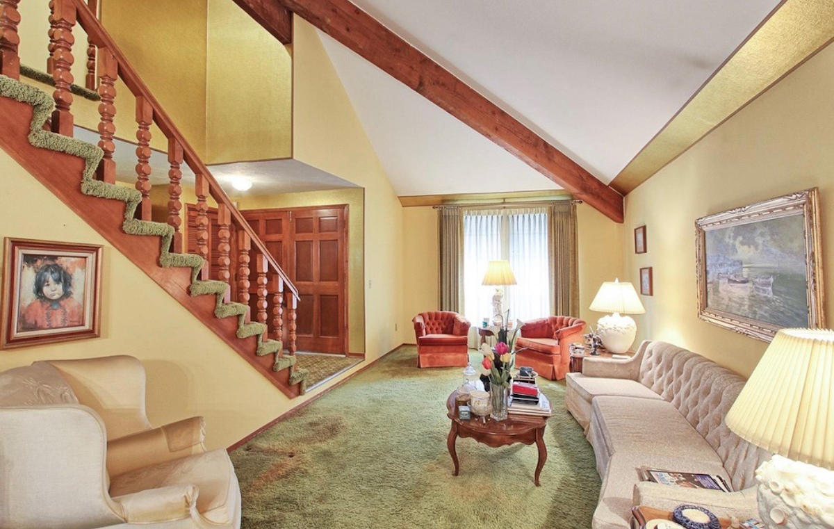 Foothills family room: (before) guess which decade this was built!