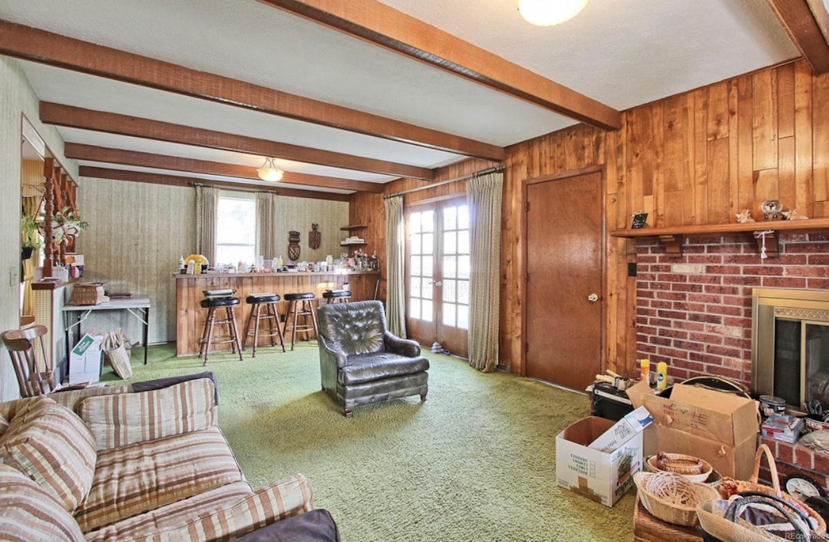 From wood to good: (before) an average living room with too much rug!