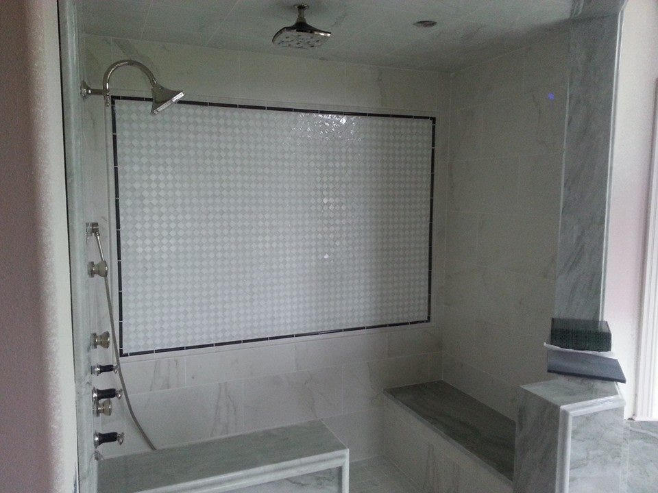 Meticulously detailed tiling in a completely custom handicapped shower